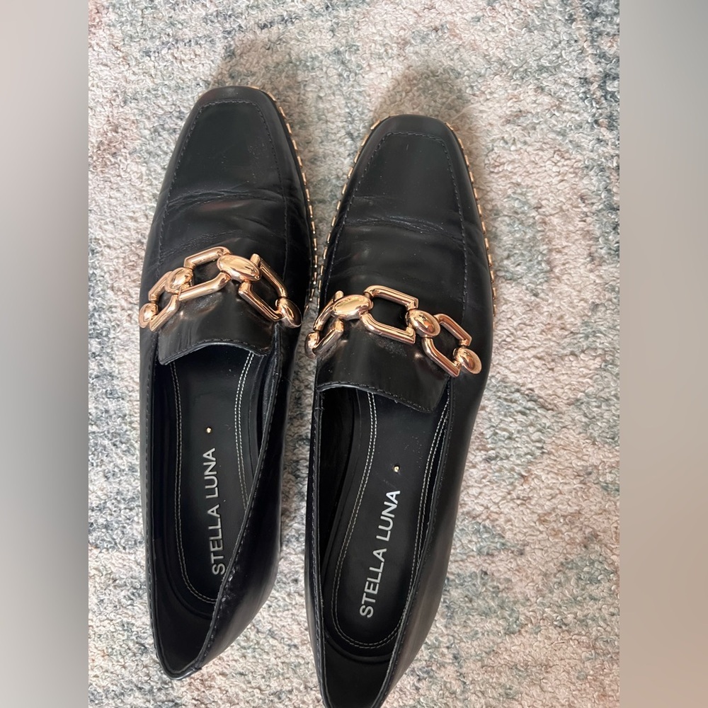 Stella Luna Black Loafers with Gold Chain